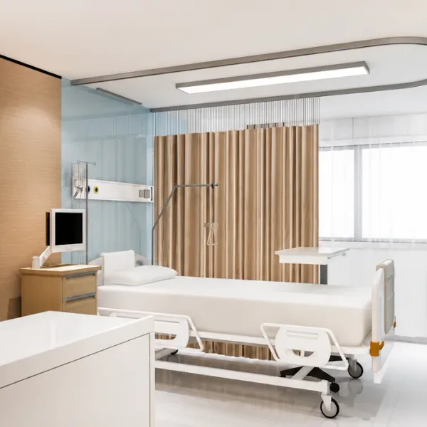 Bright clinic-themed room with two white beds