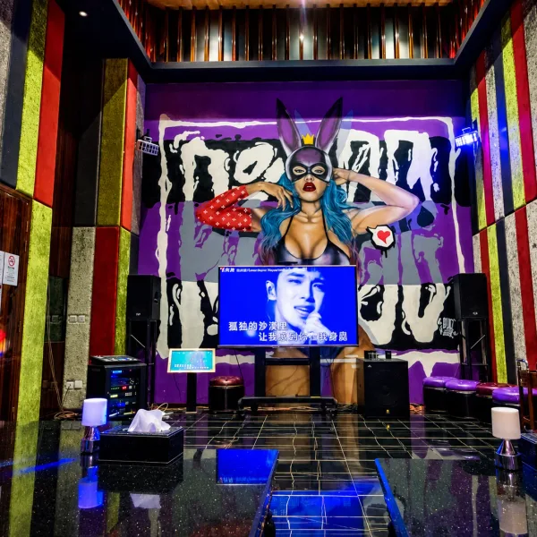 Colour-panelled stage with graffiti-style screen artwork