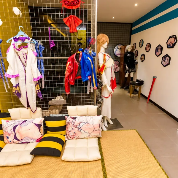 Costume display room with colourful outfits and mannequins