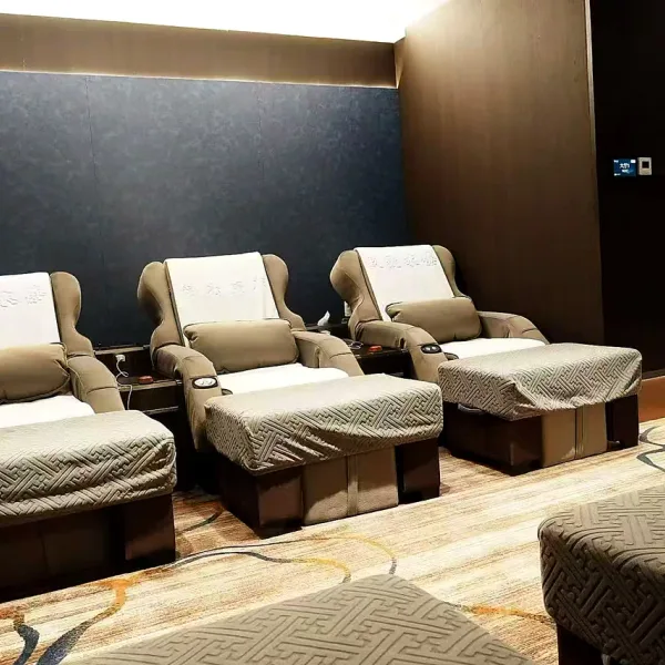 Three reclining chairs with blankets in a quiet rest room