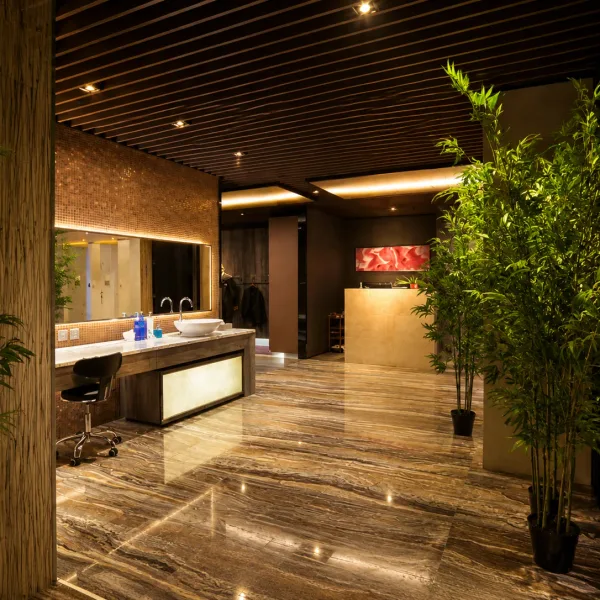 Bright marble counter area with bamboo plants