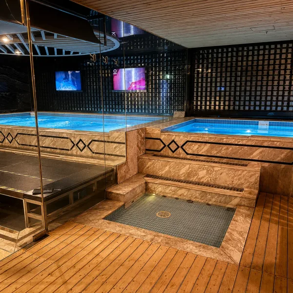 Indoor pools surrounded by a timber deck